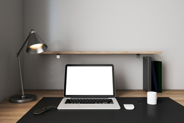 Fototapeta premium Light designer workplace with empty laptop