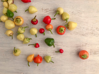 colorful fresh peppers on a wooden table