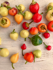 colorful fresh peppers on a wooden table