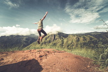 Man jumping at Ella Rock, Sri Lanka
