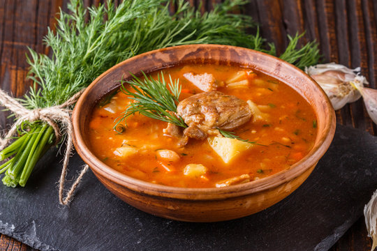 Chanahi a traditional Georgian meat stew in a bowl on stoyn board