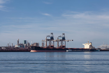 Fototapeta premium Industrial area in the Port of Rotterdam in The Netherlands. port of rotterdam zuid holland/netherlands products terminal europoort/calandkanaal