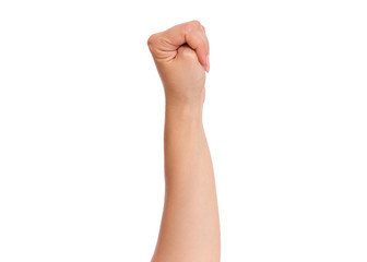 Female hand with fingers folded into fist, isolated on white background. Beautiful hand of woman with copy space.