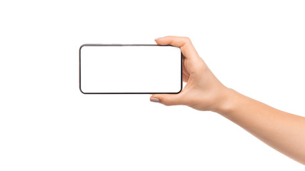 Woman's hand holding modern smartphone with blank screen for mockup