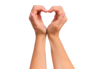 Female hands making sign Heart by fingers, isolated on white background. Beautiful hands of woman...