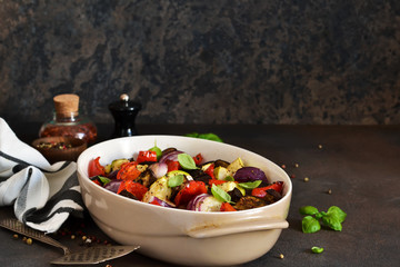 Oven Roasted Vegetables: zucchini, eggplant, tomatoes, paprika. Ratatouille is a rustic dish of vegetables.