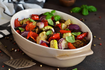 Oven Roasted Vegetables: zucchini, eggplant, tomatoes, paprika. Ratatouille is a rustic dish of vegetables.