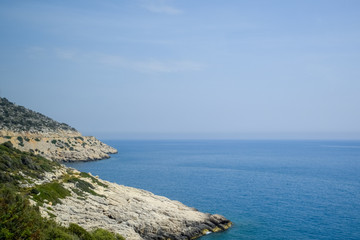 coast of the Mediterranean Sea. The shore is composed of limestone and marble.