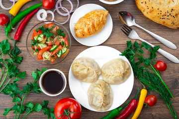Assorted Uzbek food set, pilaf, samsa, lagman, manta, shurpa Uzbek restaurant concept, Uzbek