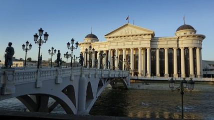 Fototapeta premium building in skopje at river during autumn