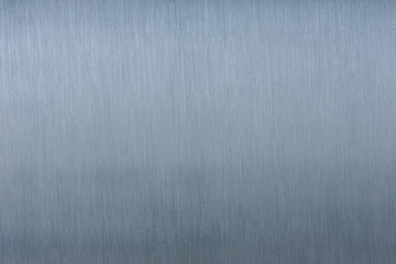 Gray metal surface, gray background with metallic stripes