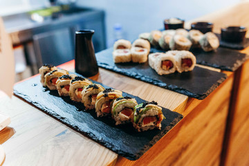 Wonderful sushi set, oriental theme on the old wooden table