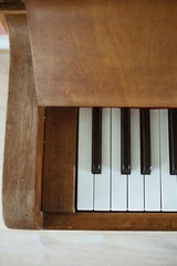 piano with musical notes