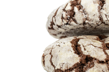Group of two whole baked chocolate brownie cookie closeup isolated on white background