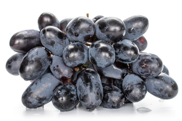 Lot of whole fresh black grape isolated on white background