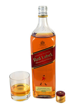 Johnnie Walker whisky bottle. Johnnie Walker is the most widely distributed blended Scotch whisky in the world with annual sales of over 130 million bottles