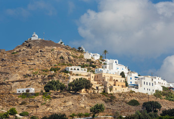 Fototapeta na wymiar Chora - The hill with the chapels in Chora town on the Ios island in the Aegean Sea (Greece).
