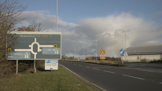 M11 road sign with truck passing