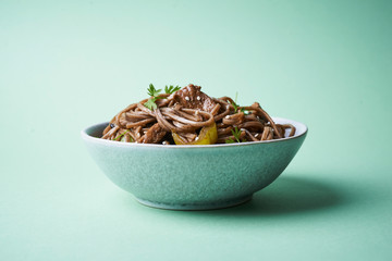 fried pork with soba in asian style