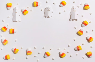 Halloween theme with paper craft decorations on a white background