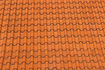 A roof tiled with imbrices and tegulae. Photo in perspective