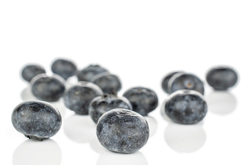 Lot of whole fresh blue blueberry isolated on white background