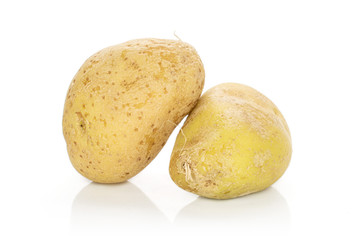 Group of two whole raw brown potato isolated on white background