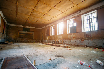 Interior of messy dirty room at old abandoned building