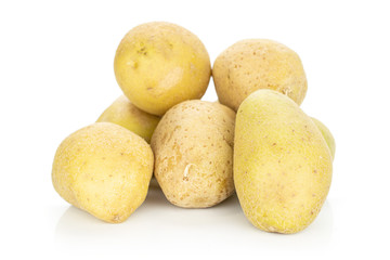 Group of six whole raw brown potato isolated on white background