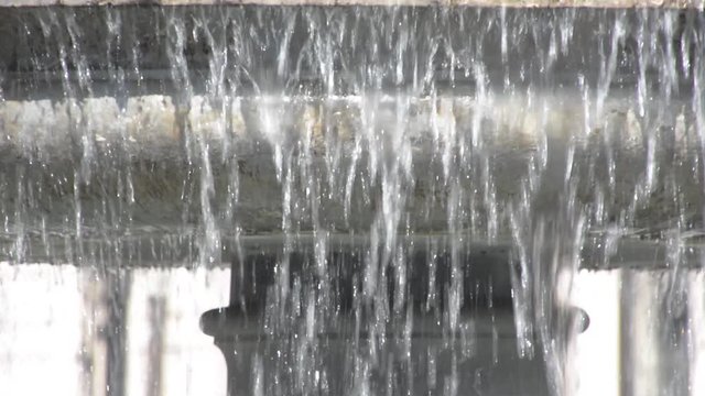 Water flowing fountain on Novi trg (New Market suare) in Ljubljana, Slovenia