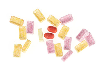 Lot of whole sweet pastel candy flatlay isolated on white background