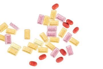 Lot of whole sweet pastel candy flatlay isolated on white background
