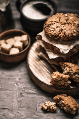 Sweet cookies with on dark textured background.