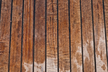 Old Wet wooden yacht deck with vertical parallel lines