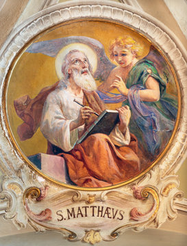 BELAGGIO, ITALY - MAY 10, 2015: The freso of St. Matthew the Evangelist in church Santa Maria Annunciata (Visgnola) Luigi Morgari (20. cent.).