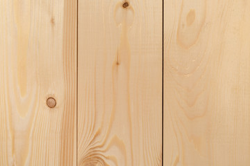 Freshly-planed wood planks closeup