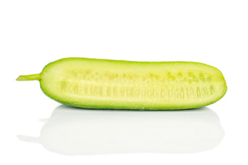 One half of mini green cucumber isolated on white background
