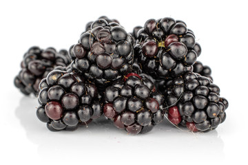 Dark lot of whole heap fresh black blackberry isolated on white background