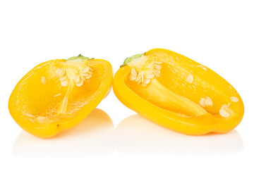 Group of two halves of fresh pepper isolated on white background