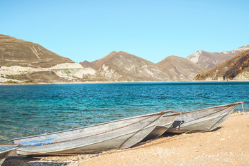 fishing boats on high mountain Kezenoyam Lake