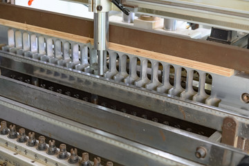 machine for handling plywood in a factory