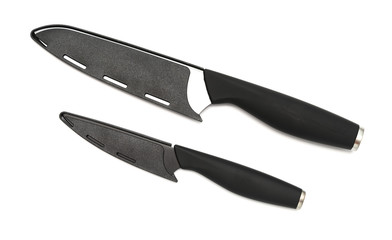 two stainless steel knives with covers on white background