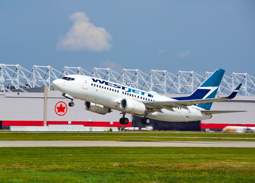 WestJet C-FWSF Boeing 737 Taking Off.