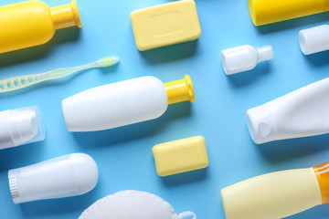 Accessories and cosmetics for personal hygiene on color background