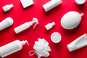 Accessories and cosmetics for personal hygiene on color background