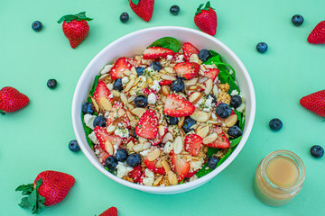 healthy salad pattern with berries .