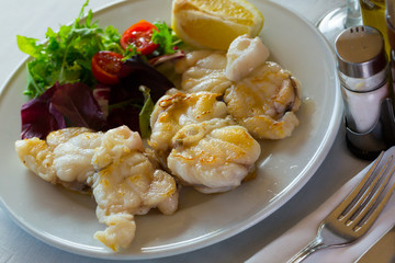 Baked pieces of monkfish