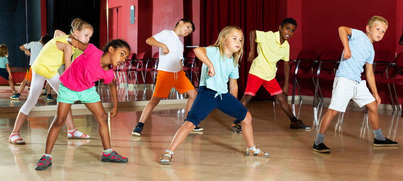 Children studying modern style dance