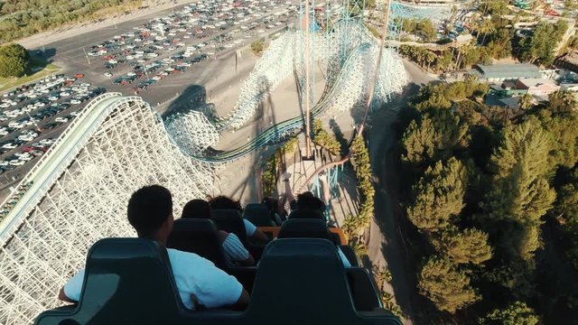 Roller coasters at Six Flags in California, first person view, lots of fun and adrenalin, extreme riding, laughing and screaming of excitement
