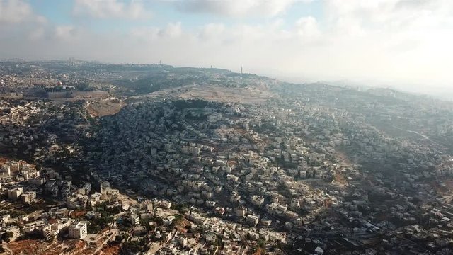 Drone Footage over East Jerusalem neighborhoods and the old city  Daylight Drone view over East Jerusalem And silwan and abu tor neighborhood